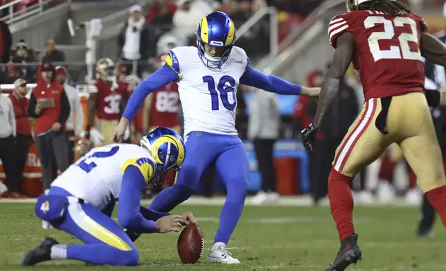 Los Angeles Rams place kicker Joshua Karty (16) kicks a field goal from the hold of Ethan Evans during the second half of an NFL football game against the San Francisco 49ers in Santa Clara, Calif., Thursday, Dec. 12, 2024. (AP Photo/Jed Jacobsohn)