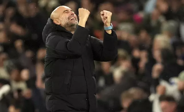 Manchester City manager Pep Guardiola reacts after Manchester City's Jeremy Doku scores his sides third goal during a Premier League soccer match against Nottingham Forest at the Etihad Stadium, Wednesday, Dec. 4, 2024, in Manchester, England. (Martin Rickett/PA via AP)