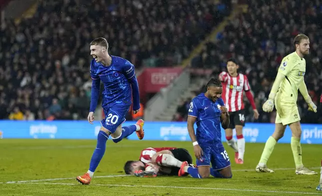 Chelsea's Cole Palmer celebrates scoring their side's fourth goal of the game during the Premier League soccer match between Southampton and Chelsea at St Mary's Stadium, Southampton, England, Wednesday Dec. 4, 2024. (Andrew Matthews/PA via AP)