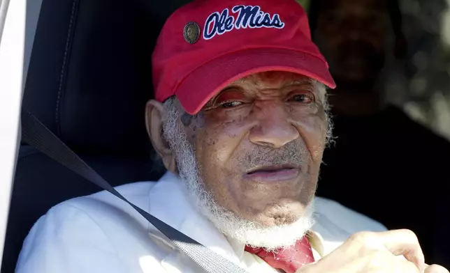 James Meredith, who became the first Black student to enroll at the University of Mississippi in 1962, acknowledges the crowd in Kosciusko, Miss., Friday, Dec. 20, 2024, during the unveiling of a Mississippi Department of Archives and History marker recognizing his birthplace and his legacy in the Civil Rights Movement. (AP Photo/Rogelio V. Solis)