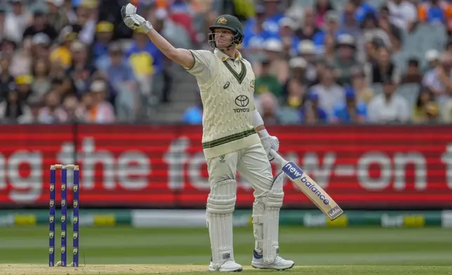 Australia's Steve Smith reacts after missing to play a shot during play on the second day of the fourth cricket test between Australia and India at the Melbourne Cricket Ground, Melbourne, Australia, Friday, Dec. 27, 2024. (AP Photo/Asanka Brendon Ratnayake)