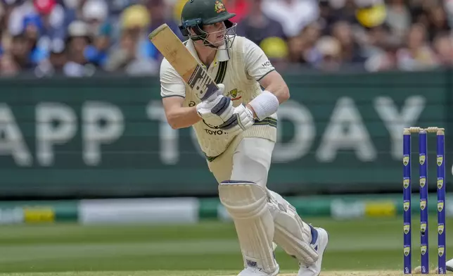 Australia's Steve Smith bats during play on the second day of the fourth cricket test between Australia and India at the Melbourne Cricket Ground, Melbourne, Australia, Friday, Dec. 27, 2024. (AP Photo/Asanka Brendon Ratnayake)