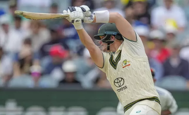 Australia's Steve Smith bats during play on the second day of the fourth cricket test between Australia and India at the Melbourne Cricket Ground, Melbourne, Australia, Friday, Dec. 27, 2024. (AP Photo/Asanka Brendon Ratnayake)