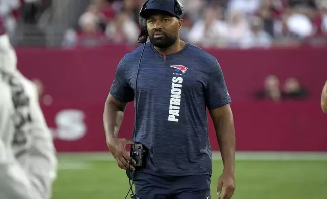 New England Patriots head coach Jerod Mayo watches during the second half of an NFL football game against the Arizona Cardinals, Sunday, Dec. 15, 2024, in Glendale, Ariz. (AP Photo/Rick Scuteri)