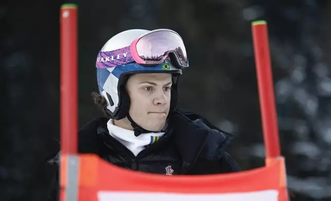 Brazil's Lucas Pinheiro Braathen concentrates ahead of an alpine ski, men's World Cup giant slalom, in Alta Badia, Italy, Sunday, Dec. 22, 2024. (AP Photo/Gabriele Facciotti)