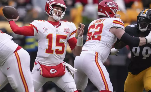 Kansas City Chiefs quarterback Patrick Mahomes (15) passes against the Pittsburgh Steelers during the first half of an NFL football game, Wednesday, Dec. 25, 2024, in Pittsburgh. (AP Photo/Gene J. Puskar)