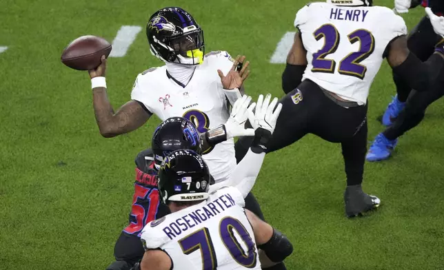 Baltimore Ravens quarterback Lamar Jackson throws a pass during the first half of an NFL football game against the Houston Texans, Wednesday, Dec. 25, 2024, in Houston. (AP Photo/Eric Christian Smith)