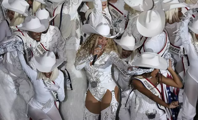 Beyoncé performs during halftime of an NFL football game between the Houston Texans and the Baltimore Ravens, Wednesday, Dec. 25, 2024, in Houston. (AP Photo/Eric Christian Smith)