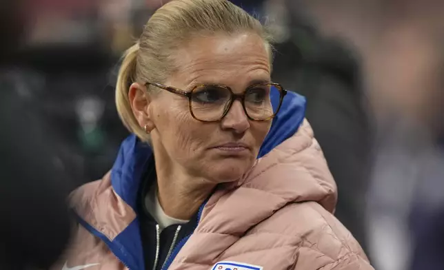 England's head coach Sarina Wiegman watches her team during the International friendly women soccer match between England and United States at Wembley stadium in London, Saturday, Nov. 30, 2024. (AP Photo/Kirsty Wigglesworth)