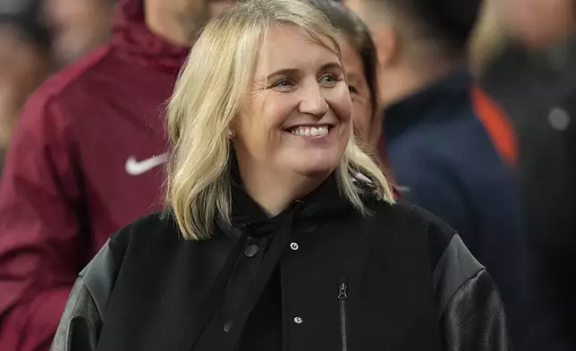 United States' manager Emma Hayes smiles during the International friendly women soccer match between England and United States at Wembley stadium in London, Saturday, Nov. 30, 2024. (AP Photo/Kirsty Wigglesworth)