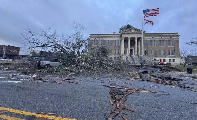 Damage from a storm through that rolled through the night before is seen at the heart of downtown on Sunday, Dec. 29, 2024, in Athens, Ala. (AP Photo/Lance George)