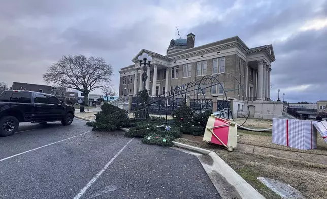 Damage from a storm through that rolled through the night before is seen at the heart of downtown on Sunday, Dec. 29, 2024, in Athens, Ala. (AP Photo/Lance George)