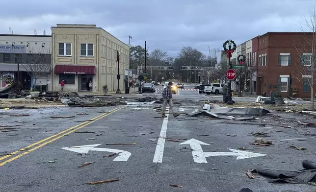 Damage from a storm through that rolled through the night before is seen at the heart of downtown on Sunday, Dec. 29, 2024, in Athens, Ala. (AP Photo/Lance George)