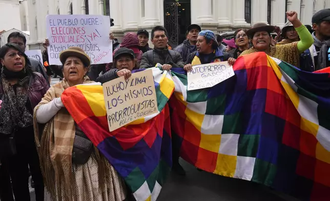 FILE - Supporters of former President Evo Morales protest the extension of the mandate for elected judges, who ruled against Morales' re-election and demand new judicial elections, in La Paz, Bolivia, Jan. 29, 2024. (AP Photo/Juan Karita, File)