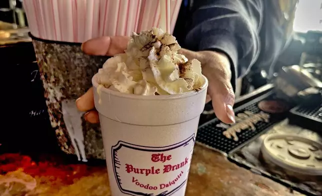 An eggnog daiquiri is shown at Lafitte's Blacksmith Shop in New Orleans on Thursday, Dec. 12, 2024. (AP Photo/Stephen Smith)