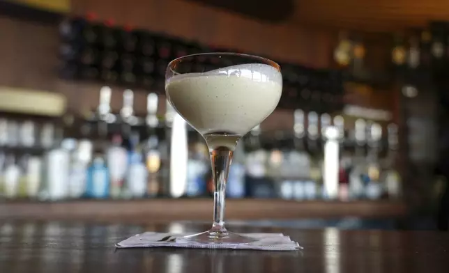 A glass of eggnog, which is prepared 11 months in advance, is shown at Scoma's Restaurant in San Francisco on Tuesday, Dec.10, 2024. (AP Photo/Terry Chea)