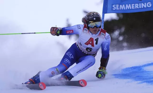 Italy's Federica Brignone speeds down the course during an alpine ski, women's World Cup giant slalom race in Semmering, Austria, Saturday, Dec. 28, 2024. (AP Photo/Giovanni Auletta)