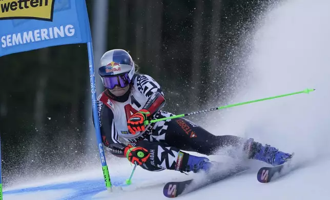 New Zealand's Alice Robinson speeds down the course during an alpine ski, women's World Cup Gian slalom race, in Semmering, Austria, Saturday, Dec. 28, 2024. (AP Photo/Piermarco Tacca)