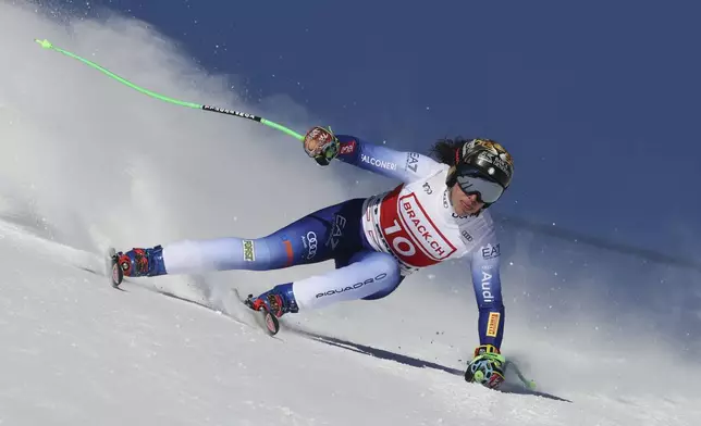 Italy's Federica Brignone competes in an alpine ski, women's World Cup super G, in St. Moritz, Switzerland, Saturday, Dec. 21, 2024. (AP Photo/Marco Trovati)