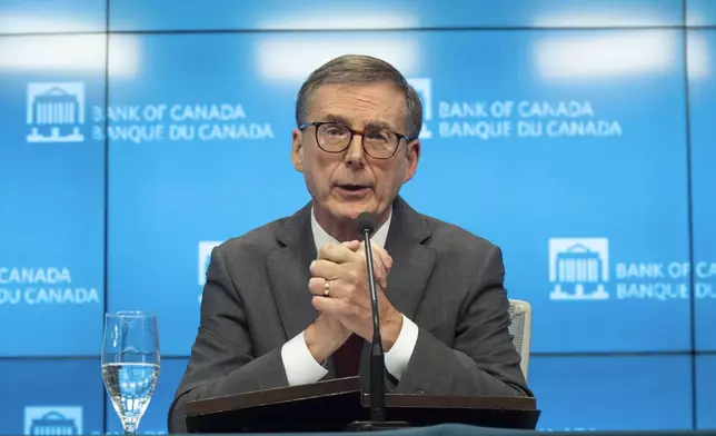 Bank of Canada Governor Tiff Macklem speaks during a news conference, Wednesday, Dec. 11, 2024 in Ottawa, Ontario. (Adrian Wyld/The Canadian Press via AP)