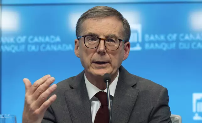 Bank of Canada Governor Tiff Macklem responds to a question during a news conference, Wednesday, Dec. 11, 2024 in Ottawa, Ontario. (Adrian Wyld/The Canadian Press via AP)