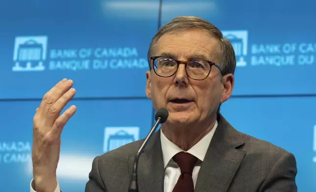 Bank of Canada Governor Tiff Macklem speaks during a news conference, Wednesday, Dec. 11, 2024 in Ottawa, Ontario. (Adrian Wyld/The Canadian Press via AP)