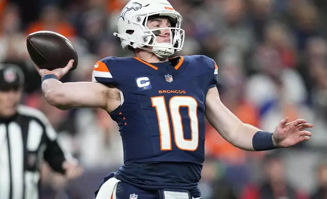 Denver Broncos quarterback Bo Nix throws during the first half of an NFL football game against the Cleveland Browns, Monday, Dec. 2, 2024, in Denver. (AP Photo/Jack Dempsey)