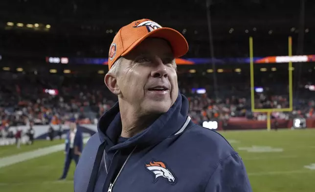 Denver Broncos head coach Sean Payton smiles as he leaves the field following an NFL football game against the Cleveland Browns, Monday, Dec. 2, 2024, in Denver. (AP Photo/Jack Dempsey)