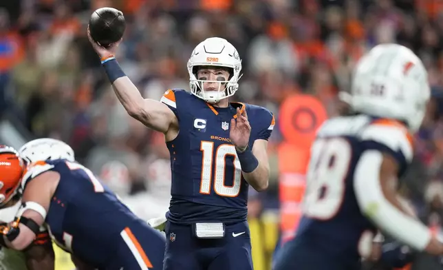 Denver Broncos quarterback Bo Nix throws during the first half of an NFL football game against the Cleveland Browns, Monday, Dec. 2, 2024, in Denver. (AP Photo/Jack Dempsey)