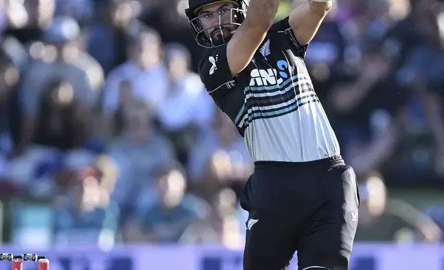 New Zealand's Tim Robinson bats during the second Twenty20 international cricket match between New Zealand and Sri Lanka at Mt. Maunganui, New Zealand Monday, Dec. 30, 2024. (Andrew Cornaga/Photosport via AP)