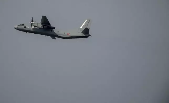 A Russian aircraft takes off at the Hmeimim Air Base, a Syrian airbase currently operated by Russia, located southeast of the city of Latakia in the town of Hmeimim, Syria, Monday Dec. 16, 2024.(AP Photo/Leo Correa)