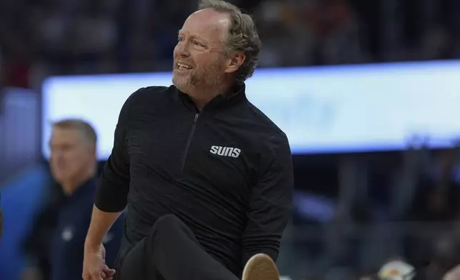 Phoenix Suns head coach Mike Budenholzer reacts during the first half of an NBA basketball game against the Golden State Warriors, Saturday, Dec. 28, 2024, in San Francisco. (AP Photo/Godofredo A. Vásquez)