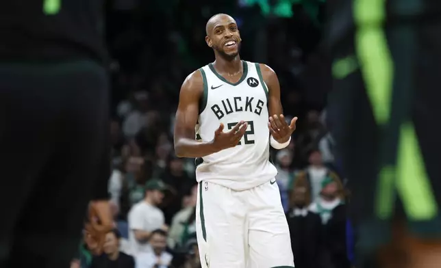 Milwaukee Bucks forward Khris Middleton (22) reacts to a call during the second half of an NBA basketball game against the Boston Celtics, Friday, Dec. 6, 2024, in Boston. (AP Photo/Mary Schwalm)