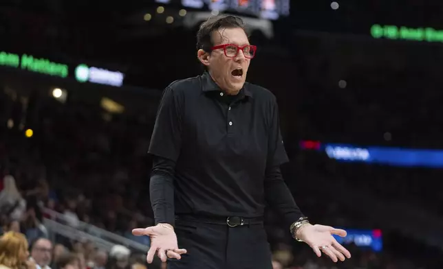 Atlanta Hawks head coach Quin Snyder reacts on the sideline during the first half of an NBA basketball game against the Denver Nuggets Sunday, Dec. 8, 2024 in Atlanta. (AP Photo/John Bazemore)