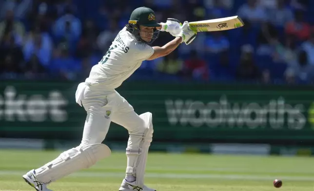 Australia's Sam Konstas plays a shot during play on the day four of the fourth cricket test between Australia and India at the Melbourne Cricket Ground, Melbourne, Australia, Sunday, Dec. 29, 2024. (AP Photo/Asanka Brendon Ratnayake)