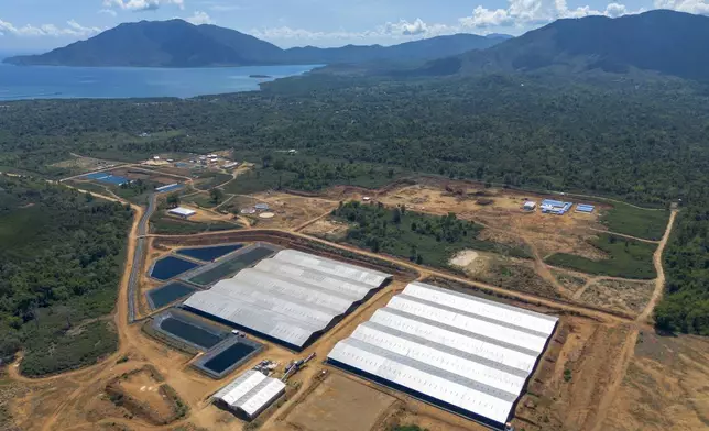 A nickel processing plant sits in Mapela village on Kabaena Island, Southeast Sulawesi, Indonesia, Saturday, Nov. 16, 2024. (AP Photo/Yusuf Wahil)