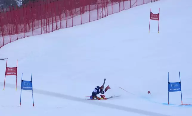 Mikaela Shiffrin, of the United States, crashes during the second run of a women's World Cup giant slalom skiing race, Saturday, Nov. 30, 2024, in Killington, Vt. (AP Photo/Robert F. Bukaty)