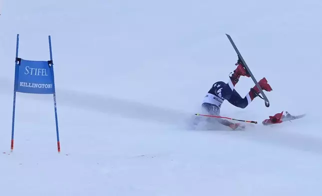 Mikaela Shiffrin, of the United States, crashes during the second run of a women's World Cup giant slalom skiing race, Saturday, Nov. 30, 2024, in Killington, Vt. (AP Photo/Robert F. Bukaty)