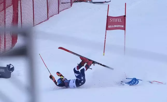 Mikaela Shiffrin, of the United States, crashes during the second run of a women's World Cup giant slalom skiing race, Saturday, Nov. 30, 2024, in Killington, Vt. (AP Photo/Robert F. Bukaty)