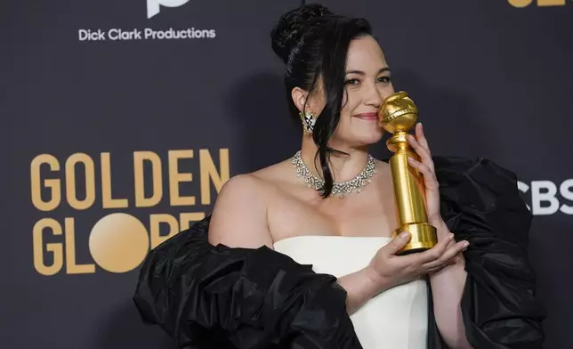 FILE - Lily Gladstone poses in the press room with the award for best performance by an actress in a motion picture, drama for "Killers of the Flower Moon" at the 81st Golden Globe Awards on Sunday, Jan. 7, 2024, at the Beverly Hilton in Beverly Hills, Calif. (AP Photo/Chris Pizzello, File)