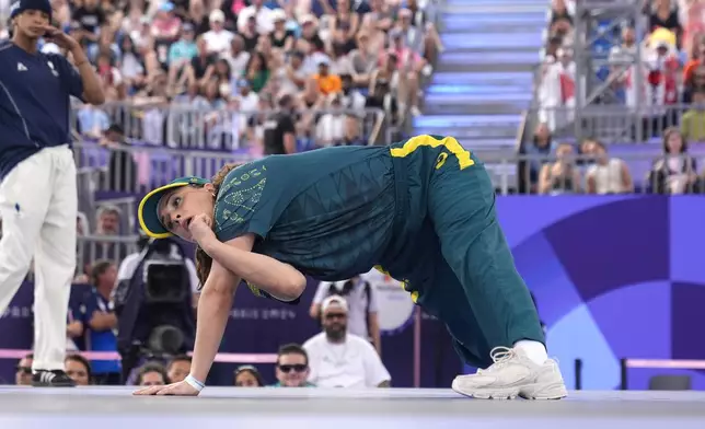 FILE - Australia's Rachael Gunn, known as B-Girl Raygun, competes during the Round Robin Battle at the breaking competition at La Concorde Urban Park at the 2024 Summer Olympics, Friday, Aug. 9, 2024, in Paris, France. (AP Photo/Frank Franklin, File)