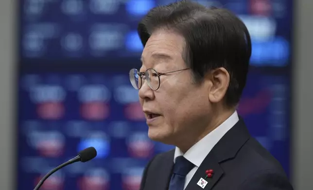 South Korea's main opposition Democratic Party leader Lee Jae-myung speaks during a press conference on removal of President Yoon Suk Yeol from office, at the party office at the National Assembly building in Seoul, South Korea, Sunday, Dec. 15, 2024. (AP Photo/Lee Jin-man)