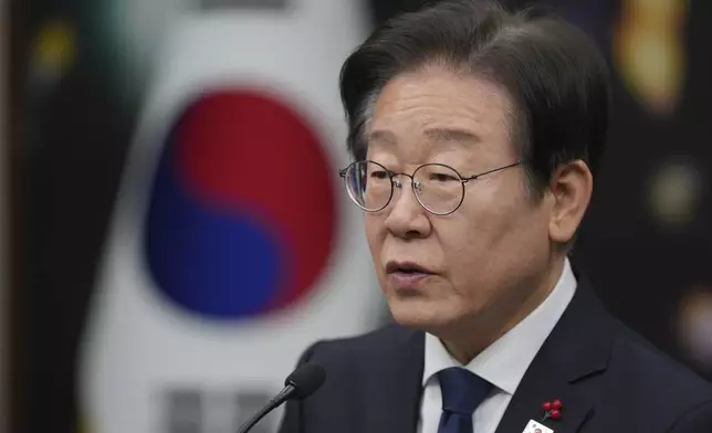 South Korea's main opposition Democratic Party leader Lee Jae-myung speaks during a press conference on removal of President Yoon Suk Yeol from office, at the party office at the National Assembly building in Seoul, South Korea, Sunday, Dec. 15, 2024. (AP Photo/Lee Jin-man)