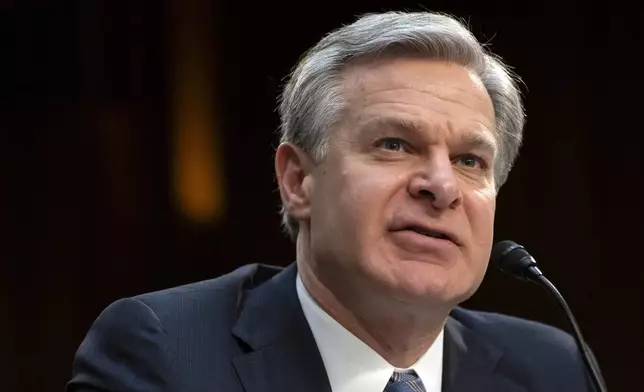 FILE - FBI Director Christopher Wray speaks during a hearing of the Senate Intelligence Committee on Capitol Hill, March 11, 2024, in Washington. (AP Photo/Mark Schiefelbein, File)