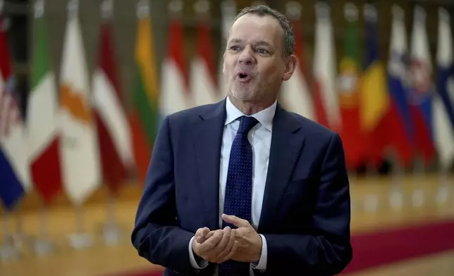 Netherland's Foreign Minister Caspar Veldkamp speaks with the media as he arrives for a meeting of EU foreign ministers at the European Council building in Brussels, Monday, Dec 16, 2024. (AP Photo/Virginia Mayo)