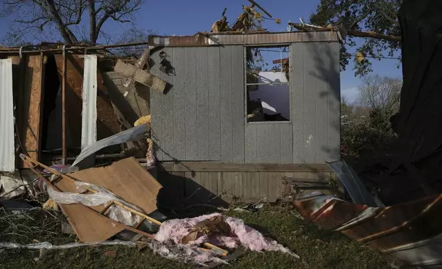 A mobile home sits damaged following a tornado that went through Katy, Texas, Saturday, Dec. 28, 2024. (Elizabeth Conley/Houston Chronicle via AP)