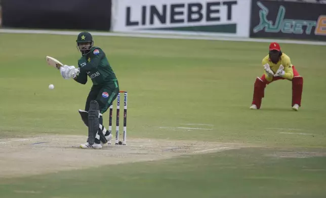Pakistan's Arafat Minhas at the wicket during the third T20 cricket match between Zimbabwe and Pakistan at Queens Sports Club in Bulawayo, Zimbabwe, Thursday, Dec. 5, 2024. (AP Photo/Wonder Mashura)