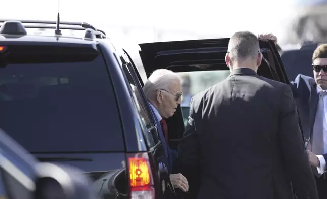 President Joe Biden gets ready to depart from Amilcar Cabral international airport on Sal island, Cape Verde Monday, Dec. 2, 2024, en route to Angola as he makes his long-promised visit to Africa. (AP Photo/Ben Curtis)