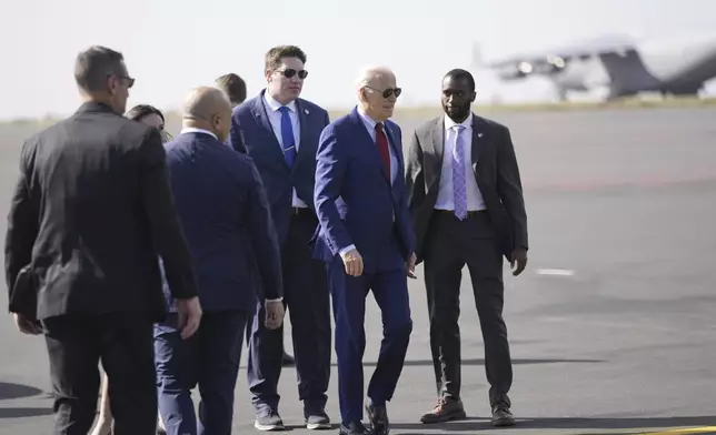 President Joe Biden gets ready to depart from Amilcar Cabral international airport on Sal island, Cape Verde Monday, Dec. 2, 2024, en route to Angola as he makes his long-promised visit to Africa. (AP Photo/Ben Curtis)