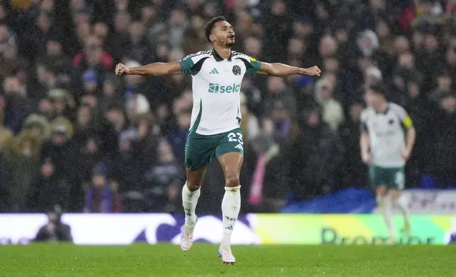 Newcastle United's Jacob Murphy celebrates scoring during the English Premier League soccer match between Ipswich Town and Newcastle United at Portman Road, Ipswich, England, Saturday Dec. 21, 2024. (Bradley Collyer/PA via AP)